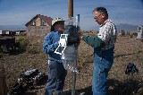 Volunteers installing Weather Station at Hydro Plant - 