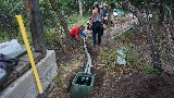 Buried fiber optic and data cable with CC volunteers - Doug Bates, Orient Land Trust